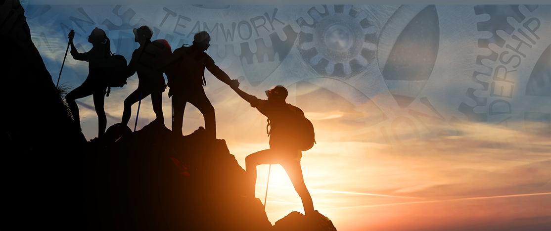 A group of four warfighters are silhouetted against a setting sun as they work together as a team to scale a cliff, above them are gears with Teamwork, innovation and leadership on them.