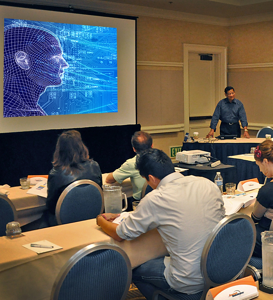 An instructor shows a AI technology speech recognition image of a silouette of a man's face speaking over a bunch of formulas to a class of New Professionals